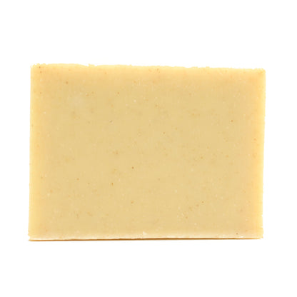 A naked bar of Plain Jane Unscented organic bar soap from ground Soap.